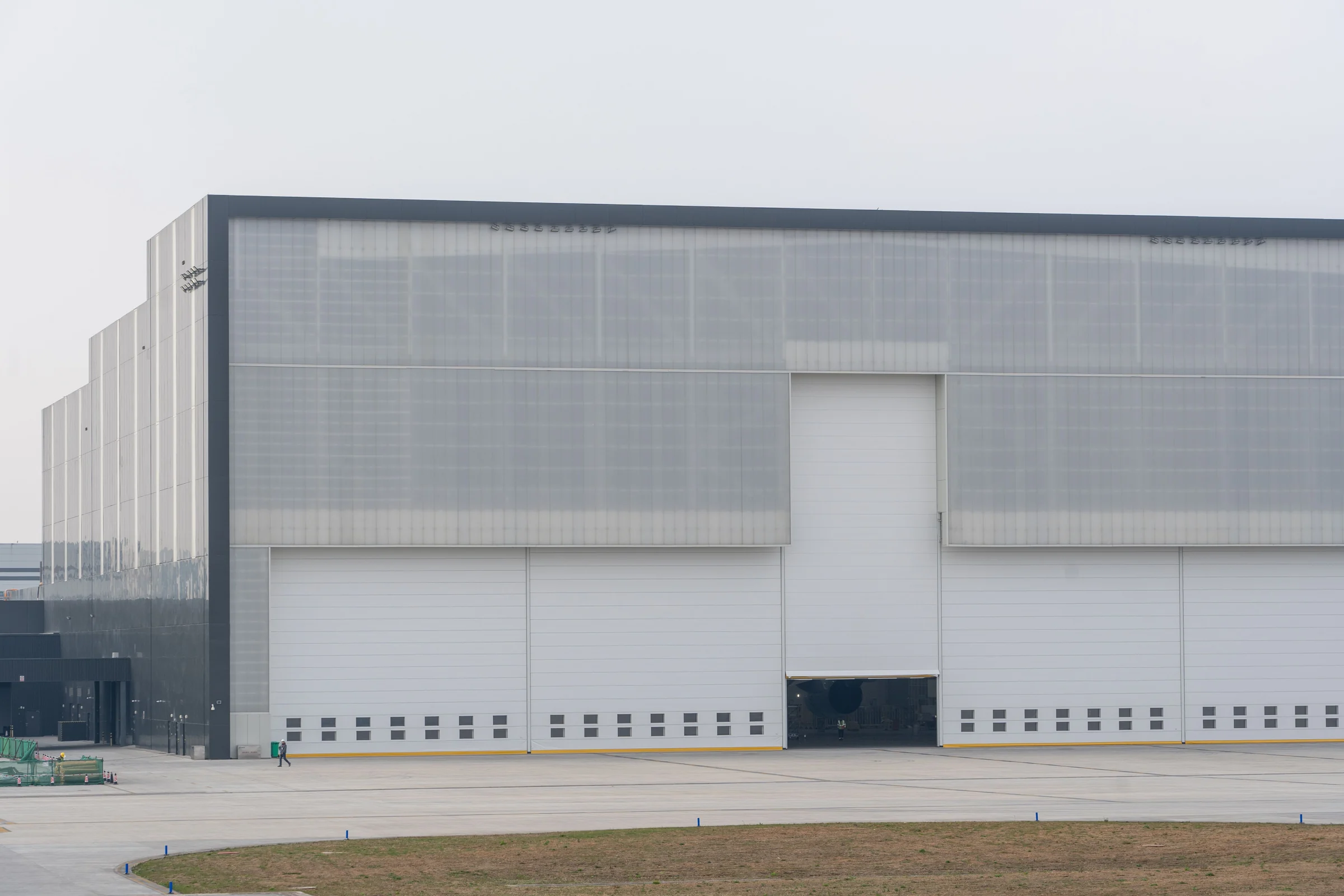 Modern temperature-controlled logistics building with multiple loading doors